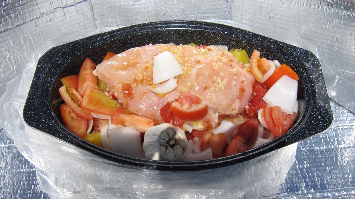 ginger in cooking pot with steam rising